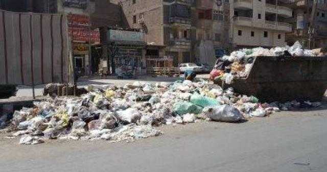 أهالي شبرا الخيمة بالقليوبية يستغيثون من تلال القمامة