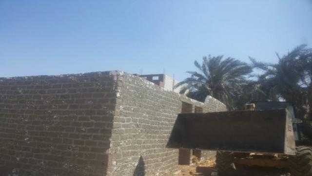 فتح طريق وإزالة تعديات على أراضي زراعية وأملاك دولة في أسيوط