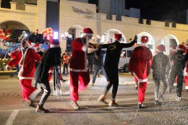 التجمع الوطني المسيحي يحيي ليلة عيد الميلاد في شوارع القدس بالقوافل الاحتفالية والدبكات