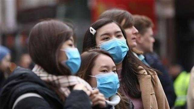 الصين تسجل 424 إصابة جديدة بفيروس كورونا