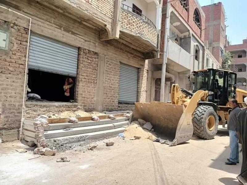 إزالة تعدٍ على الطريق العام في منطقة الصعايدة بدشنا | صور