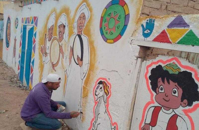 «بكار» وشخصيات رمضانية يزينون «جدارية» في رأس غارب| صور