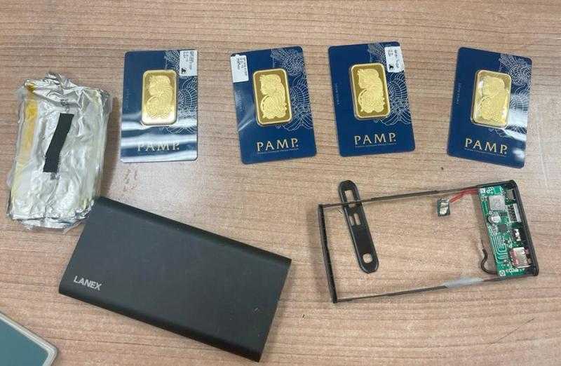 جمارك مطار القاهرة تحبط محاولة تهريب مشغولات وسبائك ذهبية وعملة أثرية