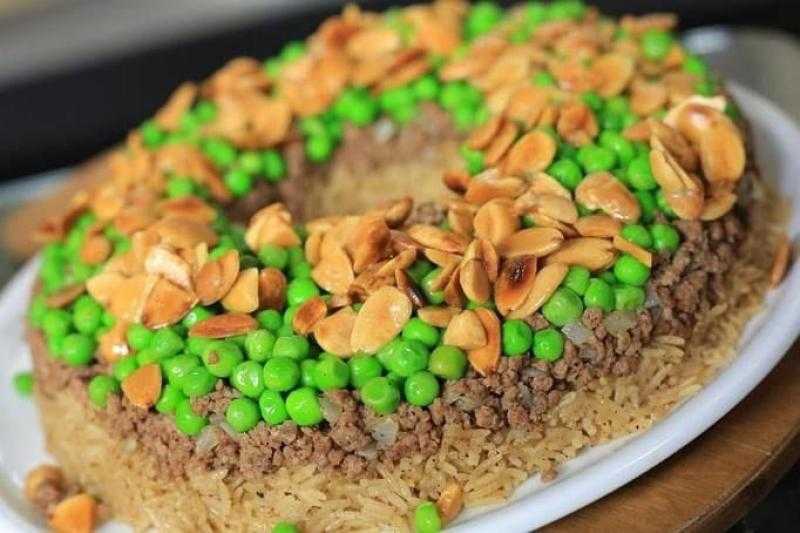 طريقة عمل الأرز المبهر بالبسلة واللحمة المفرومة