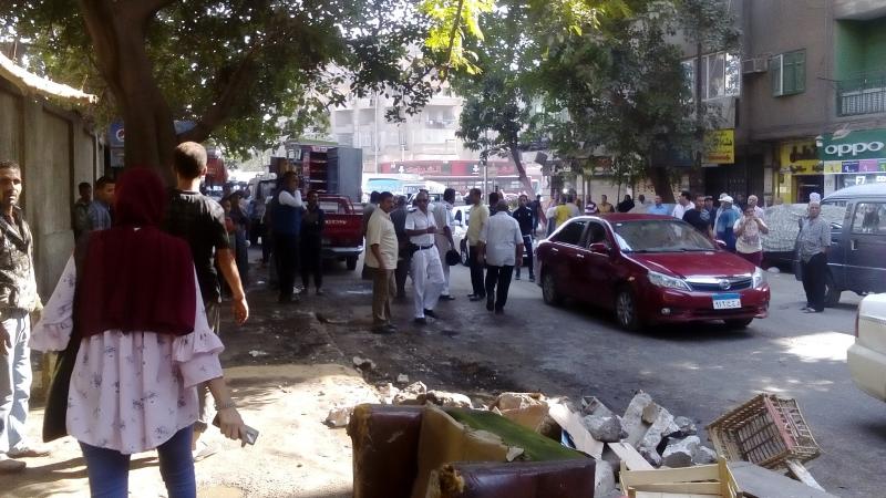 رفع إشغالات الشارع بحي الساحل
