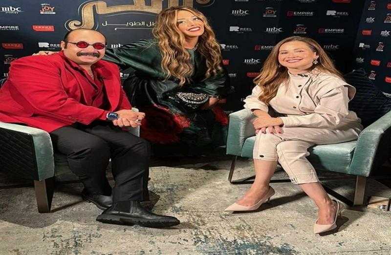 محمد ثروت رفقة ريا أبي راشد من العرض الأول لفيلم «سكر» بدبي