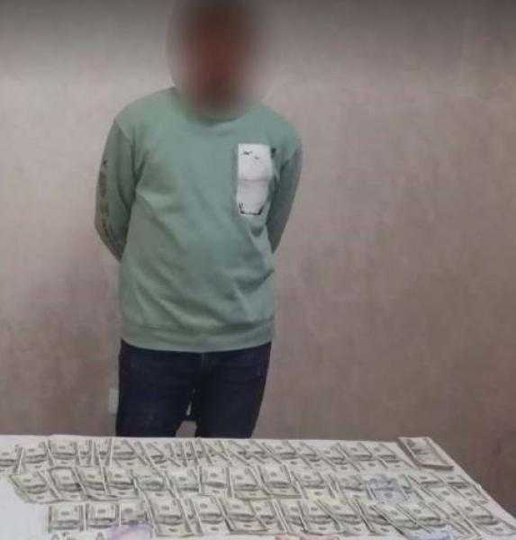 ضبط شخصين لاتجارهما غير المشروع في النقد الأجنبي