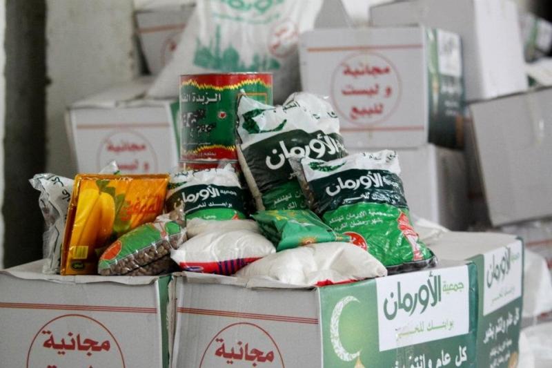 توزيع كراتين رمضان على 395 من الأسر الأولى بالرعاية في الفيو