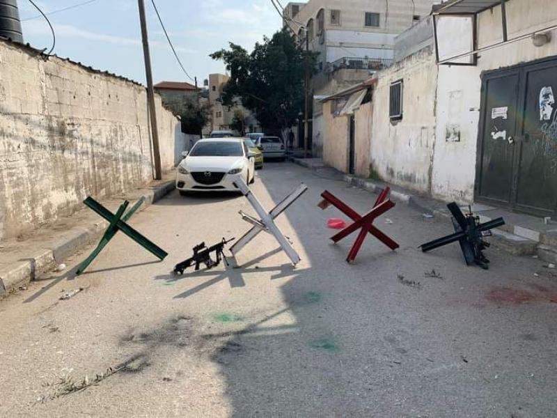 إضراب في جنين بعد اغتيال مقاوم واقتحامات بنابلس وقلقيلية