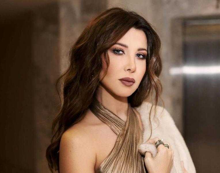 محامي أسرة فريد الأطرش: غناء نانسي عجرم لأغنية أنا وأنت ولا حد تالتنا غير قانوني