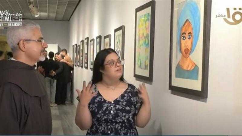 أول مصابة بمتلازمة داون تلتحق بكلية الفنون.. تنظيم معرض للوحات مريم وجيه