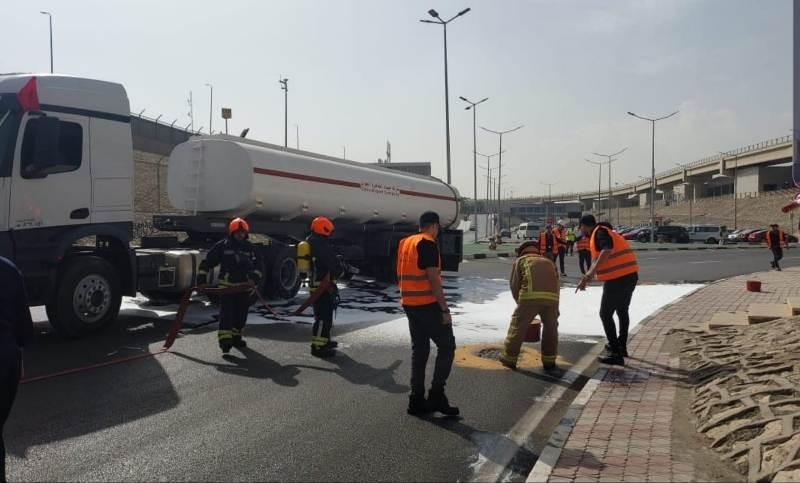 مطار القاهرة يجري تجربة طوارئ بيئية لتسرب وقود طائرات.. صور