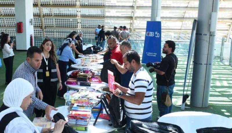 موظفو بنك CIB يشاركون في تعبئة وتوزيع 1000 حقيبة مدرسية لدعم الطلاب المحتاجين «صور»