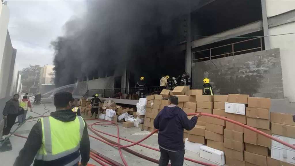 السيطرة على حريق مصنع الملابس في أكتوبر بعد إصابة 12 شخصا بحالة اختناق